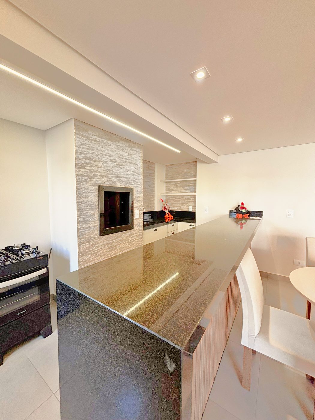 Residencial Sette — Salão de festas com churrasqueira e bancada